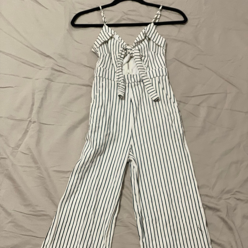 Striped key hole-tie front jumpsuit.